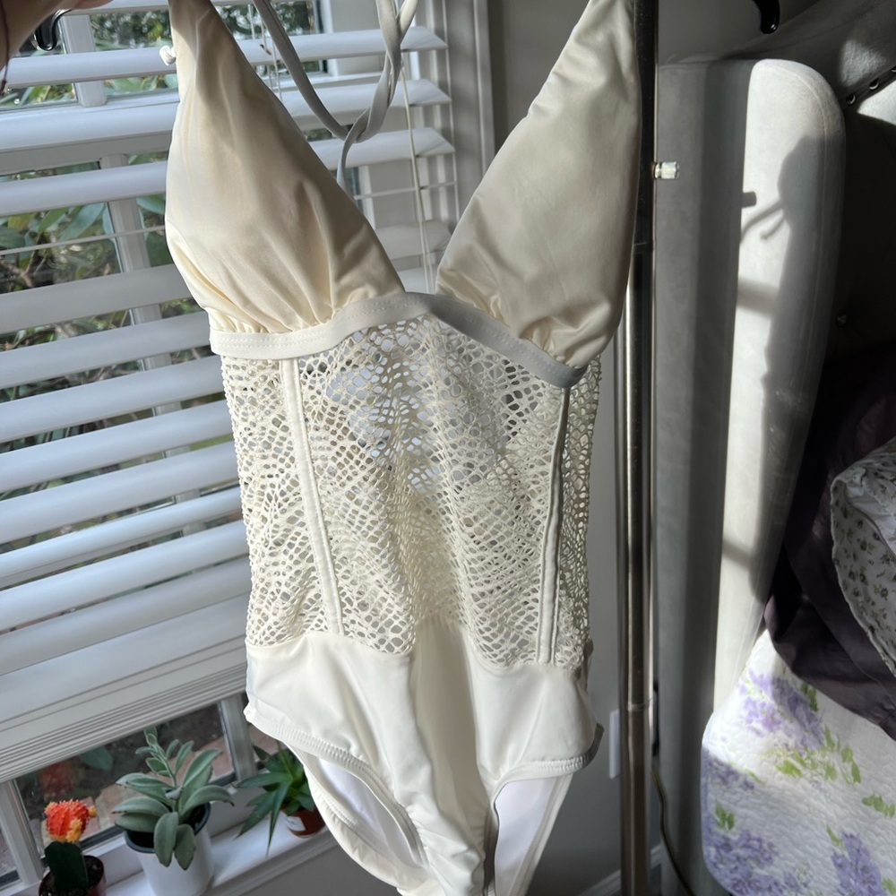 White sexy one piece bathing suit, or body suit